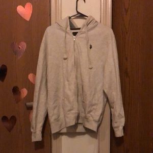 Grey and white zips up sweater